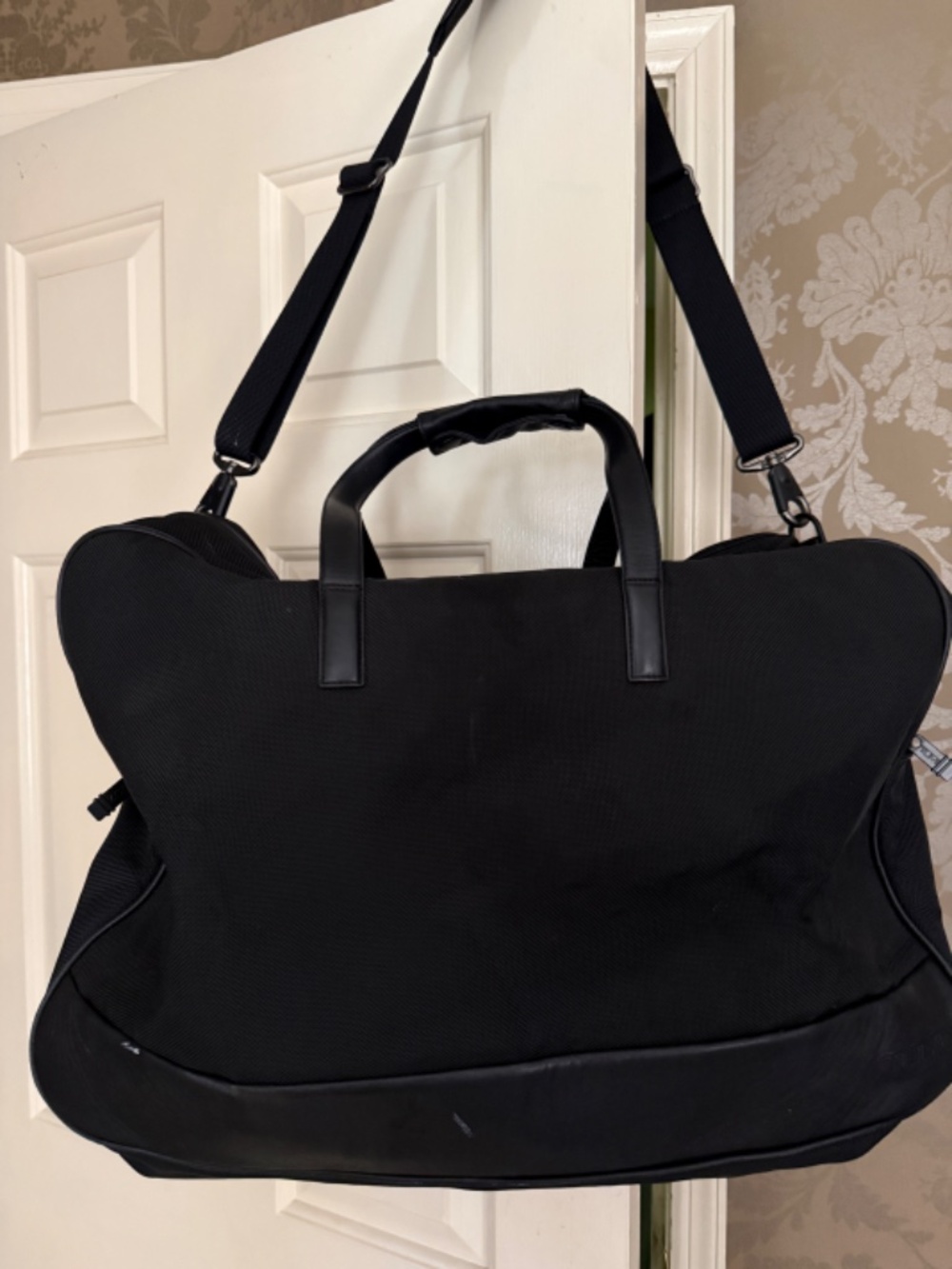 TUMI  Black Carry/Weekend Back with Leather Trim